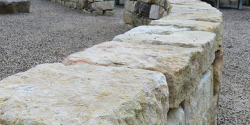 Sandstone low landscaped wall in Central Coast garden